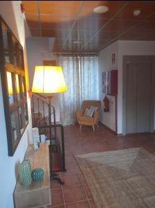 A seating area at Hostal Villa el Colmenar