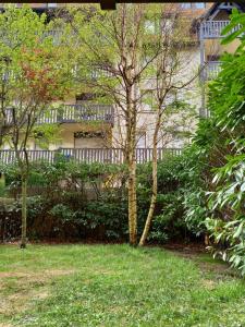 Jardín al aire libre en Le Fairway Deauville Plage