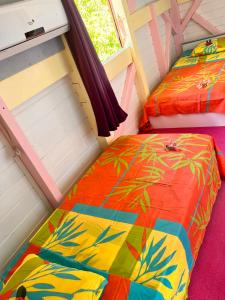 Letto o letti in una camera di Ti Calebasse