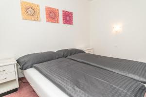 Llit o llits en una habitació de Hotel Rotes Haus