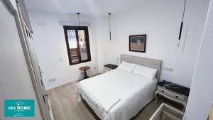 Postel nebo postele na pokoji v ubytování 180 home Luxury Redes