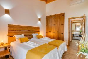 Säng eller sängar i ett rum på Monte Da Raposeira