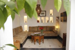Posezení v ubytování Riad Utopia Suites And Spa