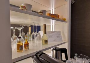 Nápoje v ubytovaní Boutique Hotel Bora & Villas Garamm
