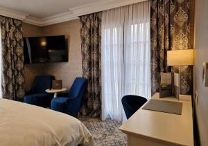 Posteľ alebo postele v izbe v ubytovaní Boutique Hotel Bora & Villas Garamm