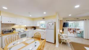 Kuchyň nebo kuchyňský kout v ubytování BEACHCOMBER home
