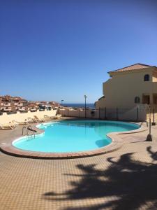Bazén v ubytovaní Residencia MIRAPUERTO alebo v jeho blízkosti