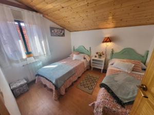 Postel nebo postele na pokoji v ubytování Adro Redondela