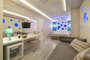 a room with a bed and a desk in a room at Hotel Evsen in Istanbul