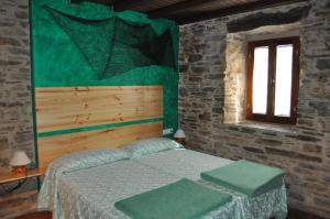 Postel nebo postele na pokoji v ubytování Calzada Romana