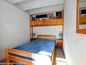 Poschodová posteľ alebo postele v izbe v ubytovaní Maison La Palmyre, 3 pièces, 6 personnes - FR-1-705-28
