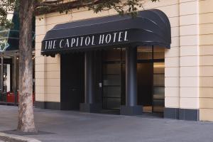 a building with a sign that reads the carroll hotel at The Capitol Hotel Sydney in Sydney