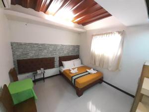 Postel nebo postele na pokoji v ubytování MelSol Hotel