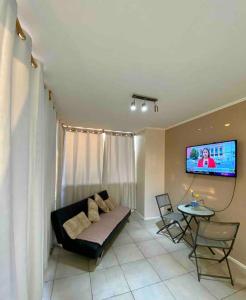 TV a/nebo společenská místnost v ubytování Espectacular vista al Mar en Avenida San Martin + 35 fotografií