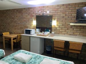 Kuchyň nebo kuchyňský kout v ubytování City View Motel