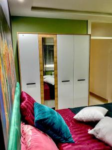 Una cama o camas en una habitación de Apartman Diana