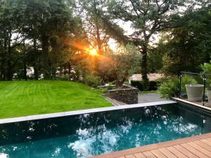 Photo de la galerie de l'établissement la villa du Lys Toulouse Occitanie Piscine & golf, à Seilh