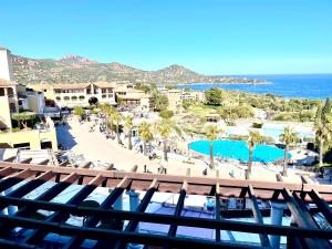 a view from the balcony of a resort with a pool at Village Cap Esterel duplex vue mer centre in Agay - Saint Raphael