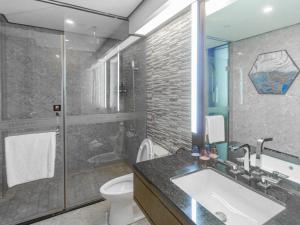 Baðherbergi á Huanyu Jun Hui Hotel