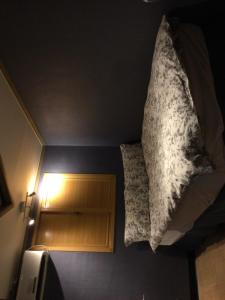 Ένα ή περισσότερα κρεβάτια σε δωμάτιο στο G Mini Hotel Dongdaemun