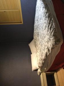 Ένα ή περισσότερα κρεβάτια σε δωμάτιο στο G Mini Hotel Dongdaemun