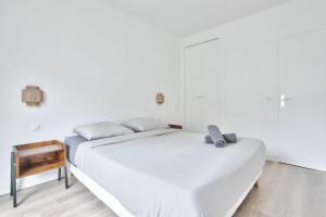 Krevet ili kreveti u jedinici u objektu Appartement Quartier Panthéon