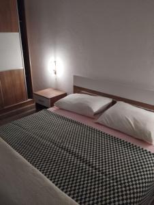 Postel nebo postele na pokoji v ubytování Apartments Vila Lavanda