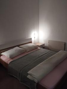 Postel nebo postele na pokoji v ubytování Apartments Vila Lavanda
