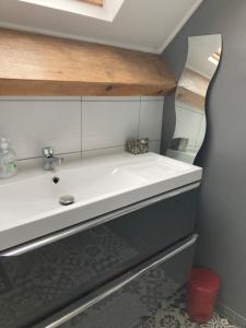 Kúpeľňa v ubytovaní Chambre meublée dans une maison