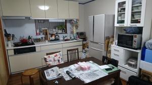 a kitchen with a table with papers on it at Toride - House / Vacation STAY 4015 in Toride