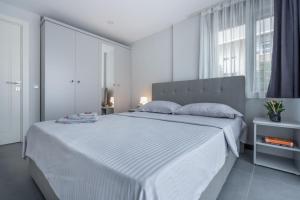 Ένα ή περισσότερα κρεβάτια σε δωμάτιο στο Rose Erela