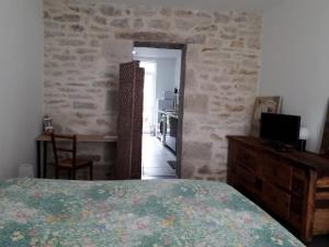 Posteľ alebo postele v izbe v ubytovaní "Jardin fleuri" - STAYHOME - appart 1