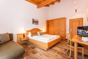 Postel nebo postele na pokoji v ubytování Berggasthof Hinterreit