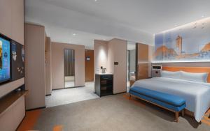 Katil atau katil-katil dalam bilik di Hampton by Hilton Shenzhen Yuanshan