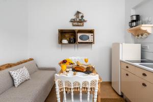 Кухня или мини-кухня в Afroditi Superior Apartments
