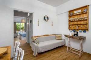 Кровать или кровати в номере Afroditi Superior Apartments
