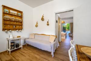 Кровать или кровати в номере Afroditi Superior Apartments