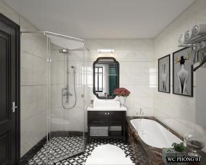 La salle de bains est pourvue d'une baignoire, d'un lavabo et d'une douche. dans l'établissement Moma Paris Hotel Ninh Bình, à Ninh Binh