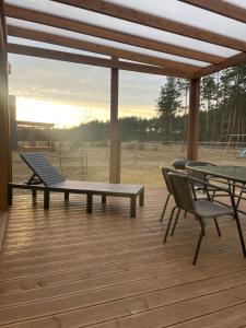 Balkón nebo terasa v ubytování Sworna łąka z zewnętrznym SPA- sauna, jacuzzi, balia