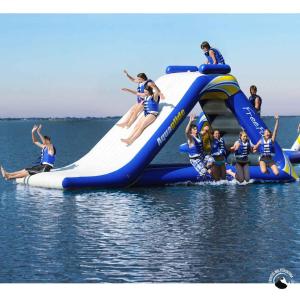 a group of people on a water slide in the water at Bungalow Arenales del Sol, Alicante in Arenales del Sol