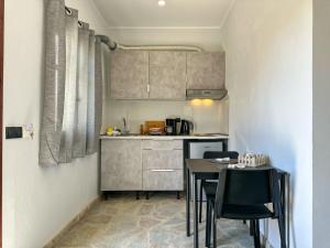 A kitchen or kitchenette at Barbara house