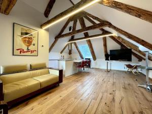 TV/trung tâm giải trí tại Mansarda Luxury