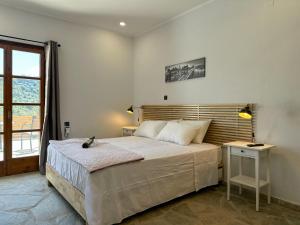 A bed or beds in a room at Barbara house