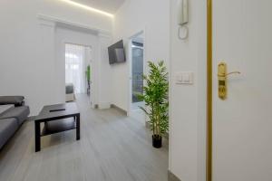 Telewizja i/lub zestaw kina domowego w obiekcie SUARA Apartamentos 2