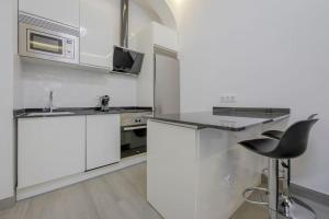Kuchnia lub aneks kuchenny w obiekcie SUARA Apartamentos 2