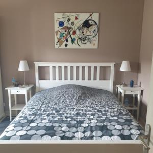 Кровать или кровати в номере Chez Cathie à Muret