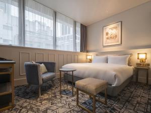 Postel nebo postele na pokoji v ubytování GINZA HOTEL by GRANBELL