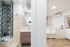 Koupelna v ubytování Touch&Go - Stanza privata con servizi + 19 fotografií