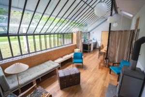 an overhead view of a living room with a large window at Gut Hornegg in Preding