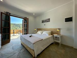 A bed or beds in a room at Barbara house